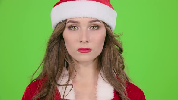 Santas Assistant Starts Smiles. Green Screen. Close Up. Slow Motion