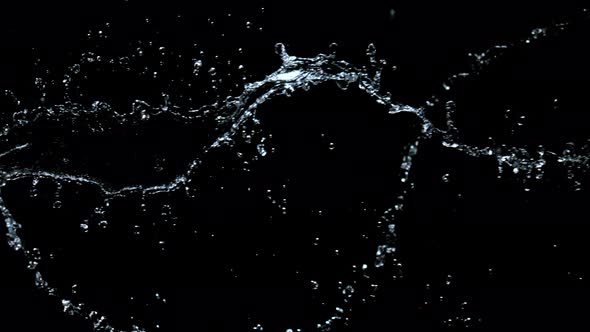 Super Slow Motion Shot of Twisting Water Splash at 1000Fps Isolated on Black Background