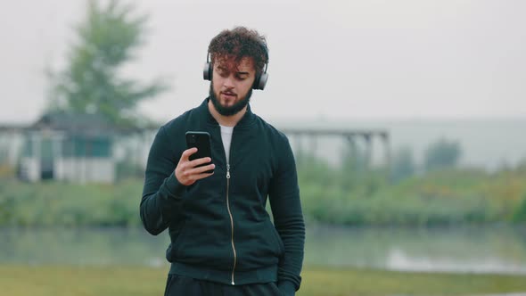 Man Listening to Music with Headphones