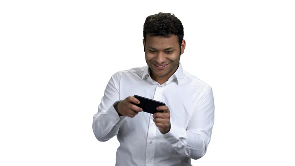 Funny Businessman Playing Game on His Phone