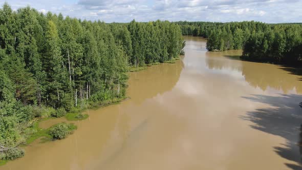 Flight Over the Taiga Forest Lake