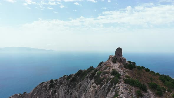 Aerial View of Ancient and Medieval Building on the Top of Mountainrocky Coastline with Green