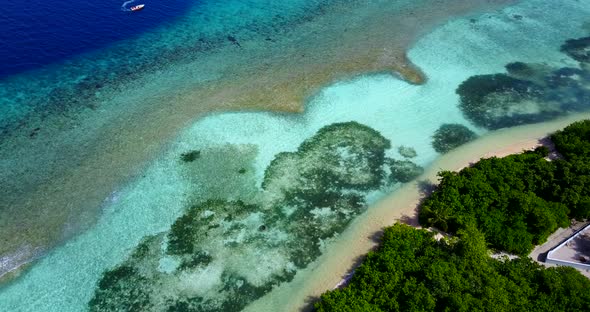 Daytime birds eye island view of a summer white paradise sand beach and blue water background in hi 