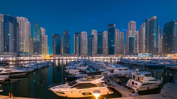 Dubai Marina at Blue Hour Night to Day Timelapse with Yachts