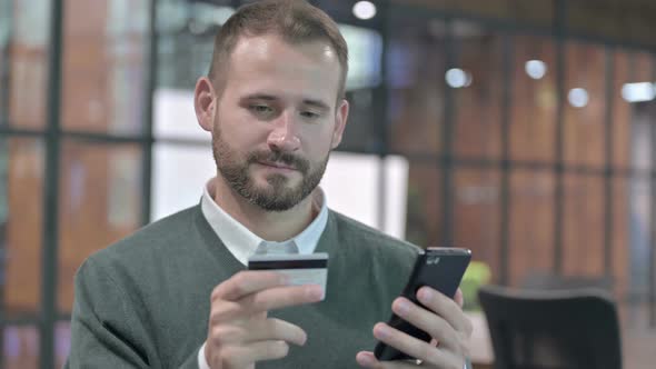 Portrait Shoot of Success Man Added Credit Card in Smartphone