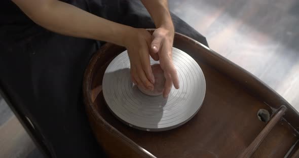 Potter Puts Colored Clay to the Potter's Wheel for Sculpting Ceramics in Nerikomi Style Neriage