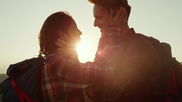 Woman and Man Touching Each Other Face