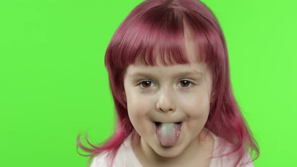 Positive Girl with Pink Hair Emotionally Make Faces and Show Tongue. Chroma Key
