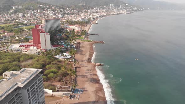 Aerial drone footage of the beautiful beach and coastal area of Puerto Vallarta in Mexico