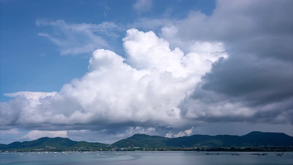 Amazing white clouds Time lapse Beautiful Blue sky and white clouds flowing over sea