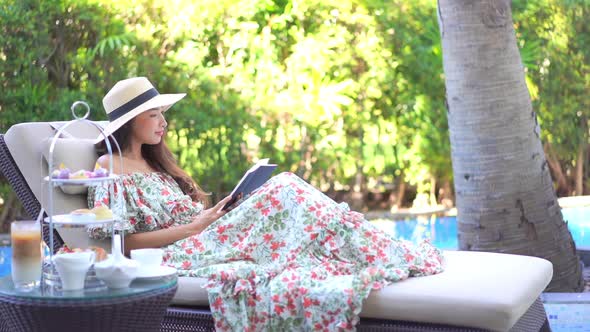 Young asian woman read book