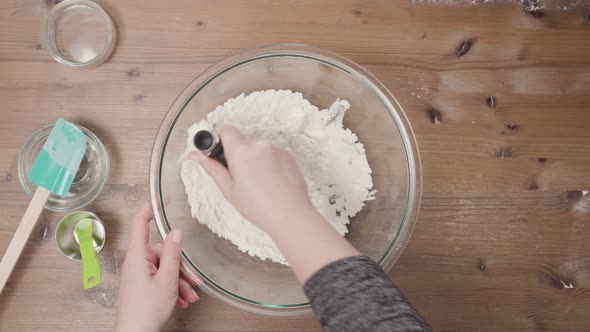 Step by step. Mixing ingredients for pie crust to bake pumpkin pie