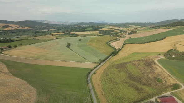 Aerial images of Tuscany in Italy cultivated fields summer,