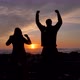 Winner Slow Motion Couple Hands Up Together with Sunlight in Background - VideoHive Item for Sale