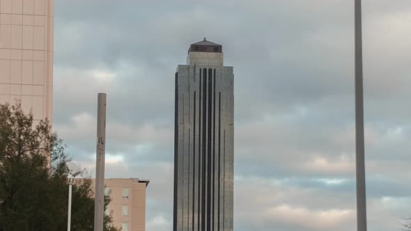 This video is about a time lapse of a cloudy sky over the Williams Tower in Houston, Texas. This vid