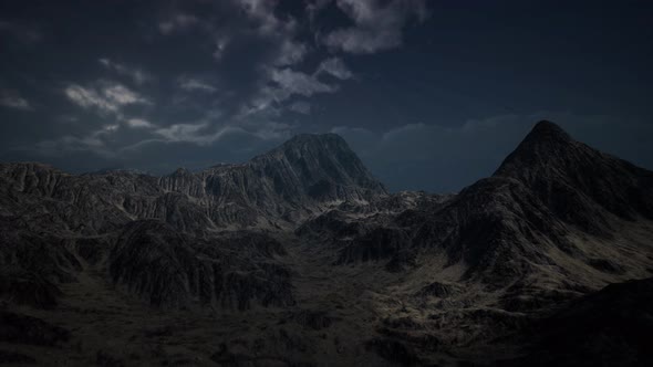 Storm Dark Clouds Over Volcanic Valley alt