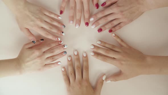 Six Hands with Fresh Glossy Professional Manicure.