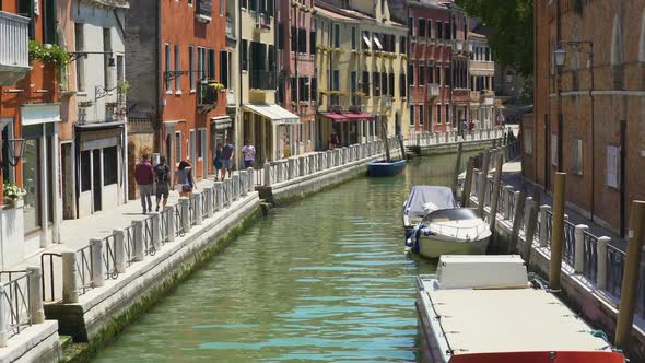 People Walking Narrow Venetian Street, Tourism and Holidays, Boats on Water