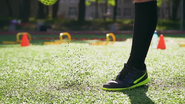 Unknown Soccer Person Doing Kick with Ball Towards the Gate or Passing to Another Player