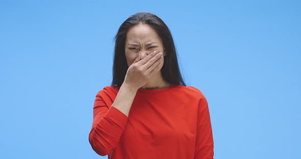 Young Woman Experiencing Bad Smell