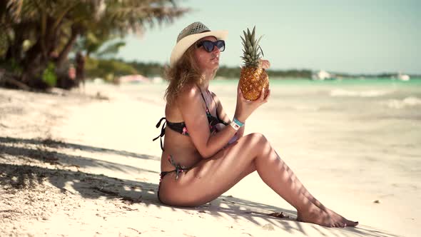 Tanned Woman In Swimsuit Healthy Skin Sunbathing Enjoy Vacation On Ocean. Tanned Girl In Bikini.