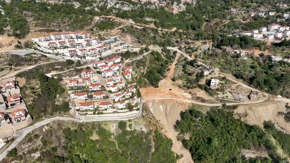 Complex of villas in the mountains aerial view 4 K