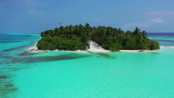Aerial top view scenery of beautiful lagoon beach journey by blue ocean with clean sandy background 