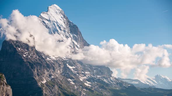 Timelapse of Eiger North Face in evening light. Stunning view of this spectacular mountain peak in G