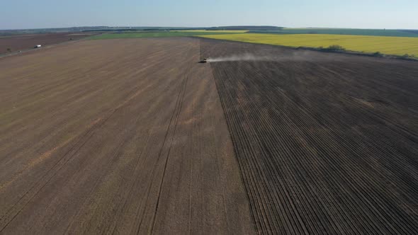 Moving tractor that plowing the fields