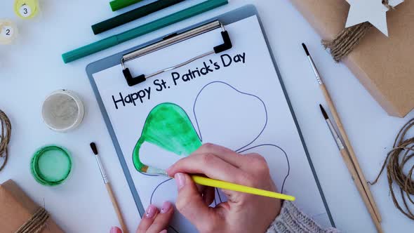 Female Hands Painting Greeting Card St Patricks Day
