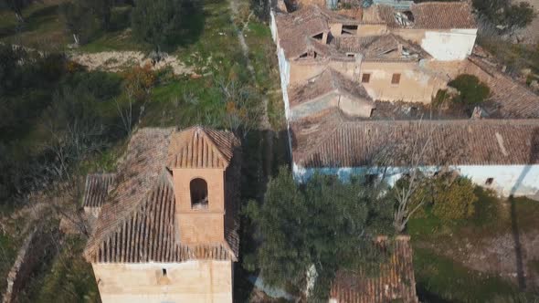 Aerial view of an abandoned village with a church in Spain.