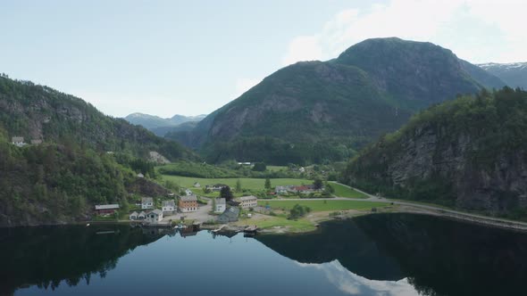 Small idyllic town Eidslandet in Vaksdal, Between Modalen and Bergen - Near to far aerial revealing