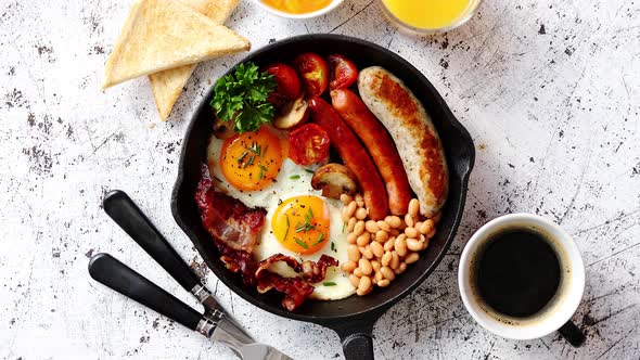 Delicious English Breakfast in Iron Cooking Pan