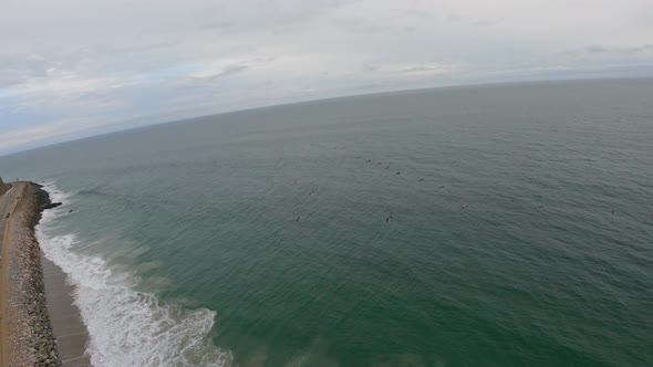 Drone Shot over Pacific Coast Highway, Crashing Ocean Waves and Majestic Mountains