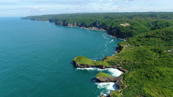 Aerial panorama of scenic cliffs on Kesirat coast, Java, Indonesia