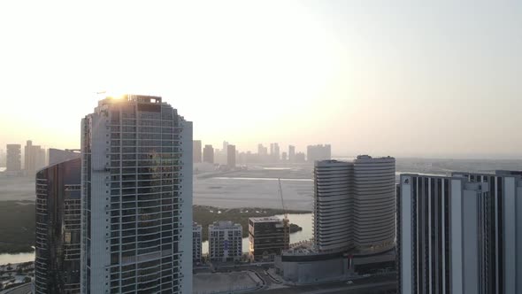 Sunset in Abu Dhabi Aerial View on Al Reem Island Surrounded By Modern Skyscrapers Between the