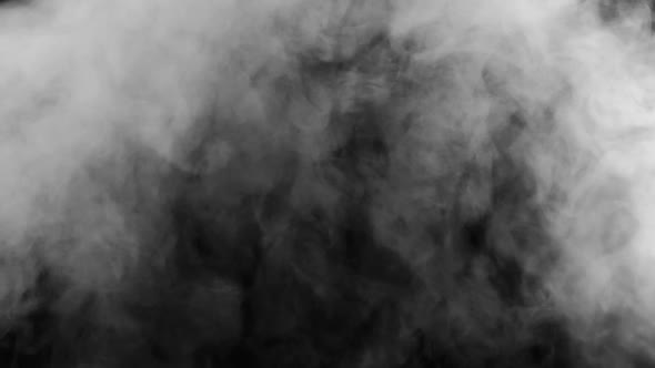 Slow Motion Abstract White Smoke Fog Steam Cloud Floating on Black Backdrop