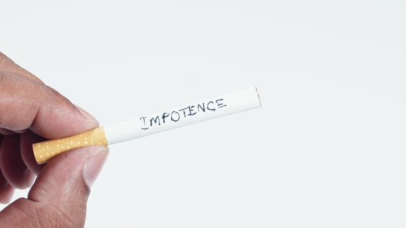 Fingers Hold Cigarette With Writing Impotence