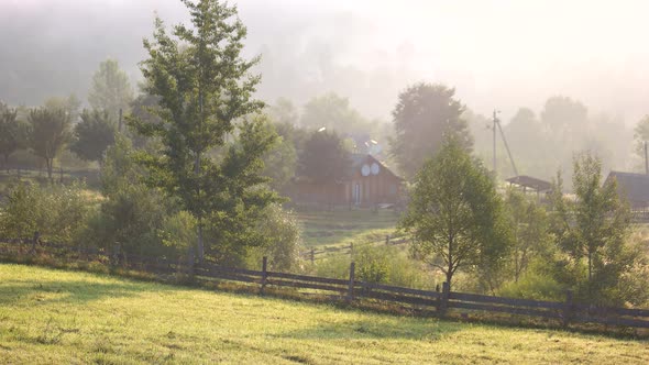 Foggy and Sunny Morning in Carpathian Mountains