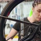 Female Technician Fixing Wheel of Bike - VideoHive Item for Sale