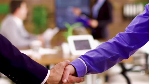 Close Up of Businessmen Shaking Hands After an Agreement