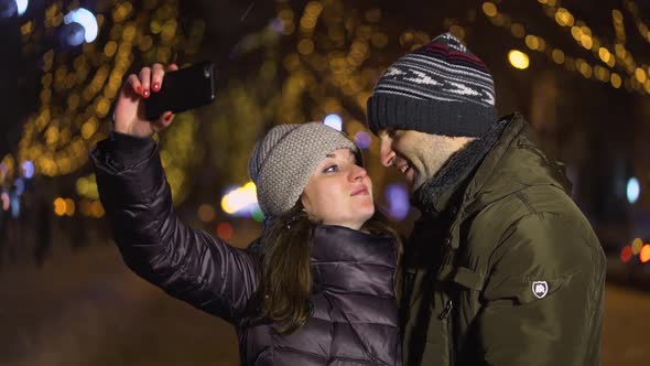 Young Couple Taking Shooting Selfie Photo