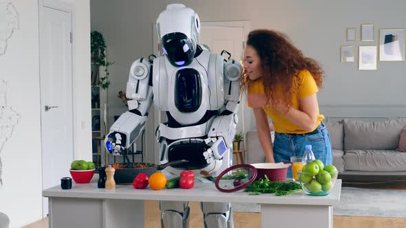Woman Is Smelling Food Cooked By the Robot