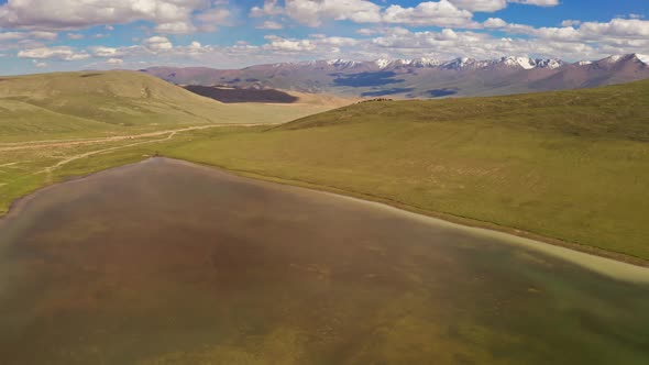 Bayinbuluku grassland and mountains in a fine day