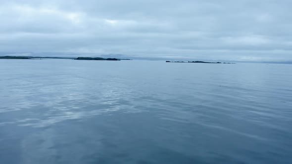 Peaceful Sea Water Near Flatey Island During Blue Hour In West Iceland. Aerial Wide