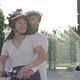Young Man Rides His Girlfriend on an Electric Scooter Around the City Square - VideoHive Item for Sale