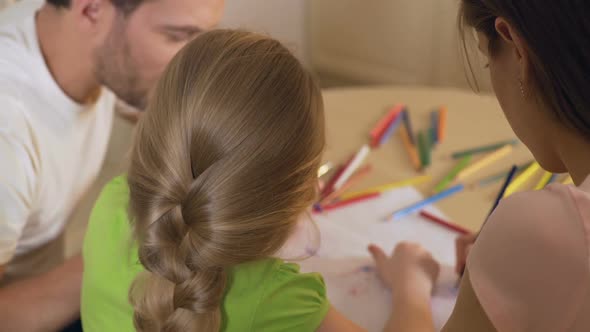 Family Drawing Colorful Pictures With Pencils, Parents Enjoying Time With Kid