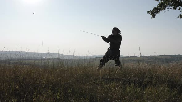 Man training with a sword