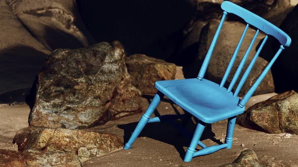 Retro Blue Wooden Chair on the Beach