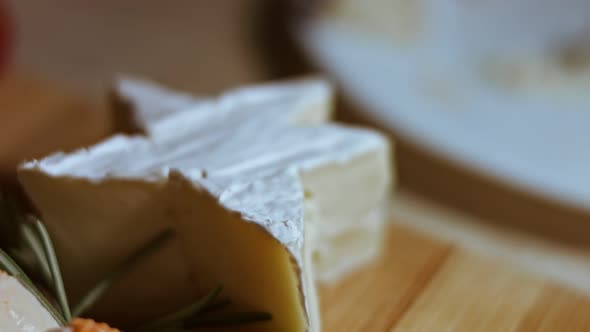 Soft Cheese Brie on a Wooden Cutting Board